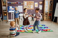 Spielteppich „ABC-Raupe“ - Group of little carefree kids having fun with soap bubbles